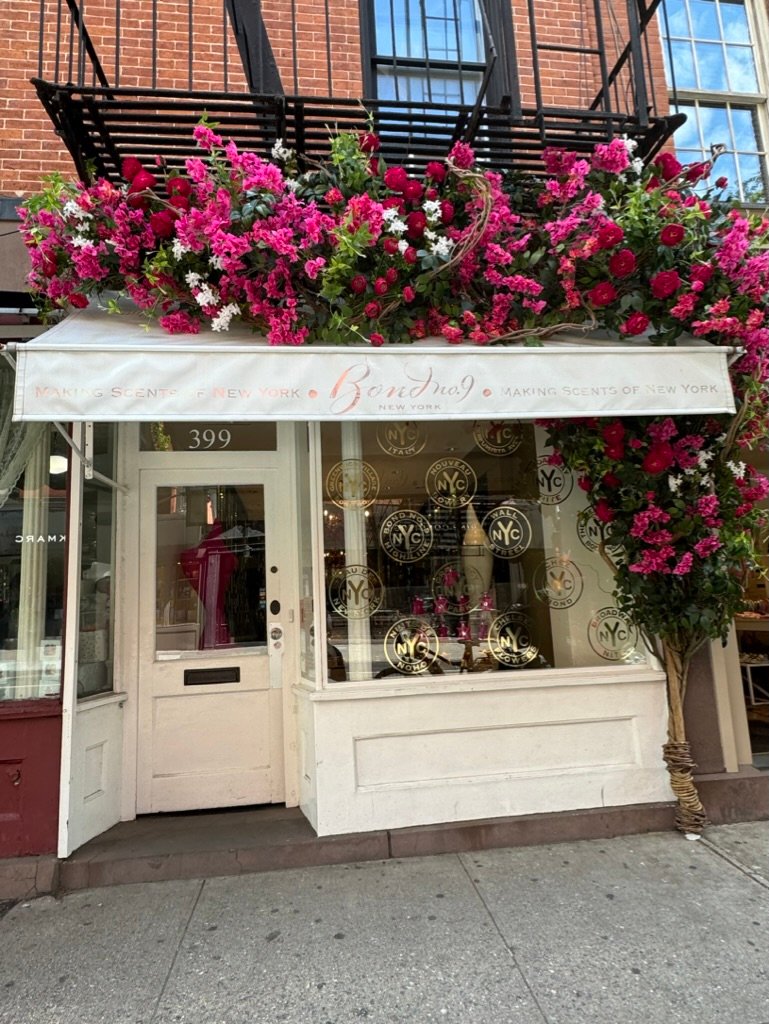 Climbing roses over the Bond No. 9 storefront on Bleecker Street